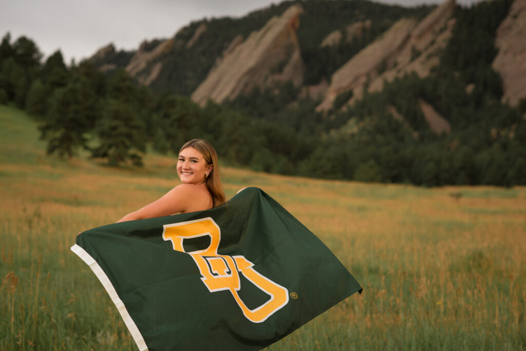 Chautauqua Park senior photos of a Castle View High School graduate showing Baylor University pride against the Boulder Flatirons.