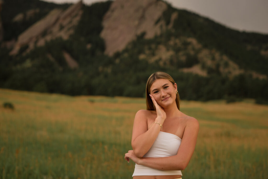 Boulder senior photography session with a Castle View High School senior framed by Colorado's iconic Flatirons.